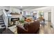 Open concept living room with fireplace, hardwood floors, and stylish decor at 1770 South Olympian Sw Way, Atlanta, GA 30310