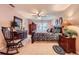Comfortable bedroom with a ceiling fan, window, and decorative dresser and mirror sets a relaxing mood at 9031 Par Dr, Douglasville, GA 30134