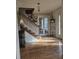 Entryway with hardwood floors, staircase, and french doors leads to other rooms at 9031 Par Dr, Douglasville, GA 30134
