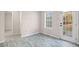 Casual dining area with vinyl plank flooring and backyard access at 90 Loudoun Dr, Covington, GA 30014