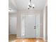 Inviting foyer featuring hardwood floors and ample natural light at 90 Loudoun Dr, Covington, GA 30014