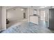 Open kitchen features a breakfast bar and stainless steel appliances at 90 Loudoun Dr, Covington, GA 30014