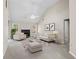 Spacious living room with vaulted ceiling, fireplace, and neutral decor at 90 Loudoun Dr, Covington, GA 30014