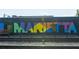 Large colorful mural spelling out the word Marietta at 1814 Butterfly Way, Marietta, GA 30066