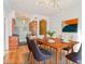 Dining room with light fixture and connected kitchen with stainless steel appliances at 908 Juniper Ne St # 205, Atlanta, GA 30309
