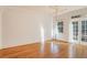 Bright, spacious room with hardwood floors and double doors to the exterior at 908 Juniper Ne St # 205, Atlanta, GA 30309