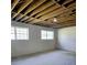 Unfinished basement with two large windows at 5005 Dublin Dr, South Fulton, GA 30331