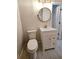 Updated bathroom with vanity and round mirror at 5005 Dublin Dr, South Fulton, GA 30331