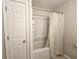 Clean bathroom with tub, shower, and linen closet at 5005 Dublin Dr, South Fulton, GA 30331