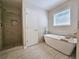 Elegant bathroom with soaking tub and walk-in shower at 5005 Dublin Dr, South Fulton, GA 30331