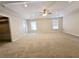Large bedroom with plush carpet and plenty of space at 5005 Dublin Dr, South Fulton, GA 30331