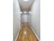 Bright hallway with hardwood floors and neutral paint at 5005 Dublin Dr, South Fulton, GA 30331