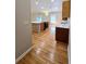 Kitchen with island, hardwood floors, and modern appliances at 5005 Dublin Dr, South Fulton, GA 30331