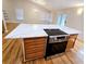 Island kitchen with quartz countertops and stainless steel appliances at 5005 Dublin Dr, South Fulton, GA 30331