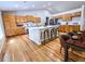 Modern kitchen with hardwood floors, large island, and breakfast bar at 5005 Dublin Dr, South Fulton, GA 30331
