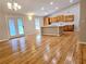 Open concept kitchen with island and hardwood floors at 5005 Dublin Dr, South Fulton, GA 30331