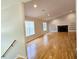 Hardwood floor living room with fireplace and vaulted ceiling at 5005 Dublin Dr, South Fulton, GA 30331