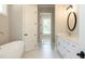 Elegant bathroom featuring a freestanding tub and double vanity at 1150 Sweet Mia Ln, Powder Springs, GA 30127