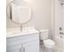 Clean bathroom with white vanity, toilet, and bathtub at 1150 Sweet Mia Ln, Powder Springs, GA 30127