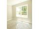 Bright bedroom with large window and neutral wall colors at 1150 Sweet Mia Ln, Powder Springs, GA 30127