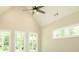 Bright bedroom with vaulted ceiling and multiple windows at 1150 Sweet Mia Ln, Powder Springs, GA 30127