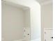 Neutral-toned bedroom with built-in storage and carpet flooring at 1150 Sweet Mia Ln, Powder Springs, GA 30127