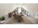 Versatile bonus room with home office and exercise bike setup at 1150 Sweet Mia Ln, Powder Springs, GA 30127