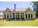 House exterior showcasing a large covered porch at 1150 Sweet Mia Ln, Powder Springs, GA 30127