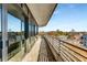 Spacious condo balcony featuring brick flooring, metal railings, and beautiful outdoor space at 750 Park Ne Ave # 8E, Atlanta, GA 30326