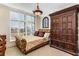 Well-lit bedroom with a large window and ample storage in the stylish wardrobe at 750 Park Ne Ave # 8E, Atlanta, GA 30326