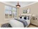 Bright bedroom with large windows, modern décor, and city views at 750 Park Ne Ave # 8E, Atlanta, GA 30326