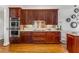 Well-equipped kitchen with stainless steel double oven, granite countertops and custom cabinets at 750 Park Ne Ave # 8E, Atlanta, GA 30326