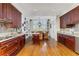 Open kitchen layout with stainless steel appliances and hardwood floors at 750 Park Ne Ave # 8E, Atlanta, GA 30326