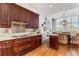 Kitchen featuring stainless steel appliances, custom cabinetry, and hardwood floors at 750 Park Ne Ave # 8E, Atlanta, GA 30326