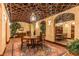 Large wine cellar with vaulted ceiling, wooden accents, display lighting, and table for wine tasting at 750 Park Ne Ave # 8E, Atlanta, GA 30326