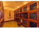 Temperature controlled wine storage with lattice enclosed wooden racks, perfect for the wine connoisseur at 750 Park Ne Ave # 8E, Atlanta, GA 30326