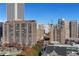 Aerial view of the building and surrounding cityscape, showcasing the building's location and neighborhood at 565 Peachtree Ne St # 1509, Atlanta, GA 30308