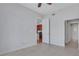 Bedroom with hardwood floors and access to bathroom and kitchen at 565 Peachtree Ne St # 1509, Atlanta, GA 30308
