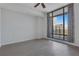 Bright bedroom with hardwood floors and city view at 565 Peachtree Ne St # 1509, Atlanta, GA 30308