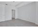 Spacious bedroom with hardwood floors and access to hallway at 565 Peachtree Ne St # 1509, Atlanta, GA 30308