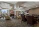 Spacious clubhouse with comfortable seating, a kitchenette, and large windows at 565 Peachtree Ne St # 1509, Atlanta, GA 30308