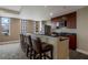 Clubhouse kitchenette with bar seating and modern appliances at 565 Peachtree Ne St # 1509, Atlanta, GA 30308