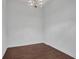 Bright dining room with hardwood floors and elegant chandelier at 565 Peachtree Ne St # 1509, Atlanta, GA 30308