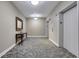 Building hallway with carpet, neutral walls, and elevator access at 565 Peachtree Ne St # 1509, Atlanta, GA 30308