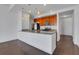 Open concept kitchen with granite counters and island at 565 Peachtree Ne St # 1509, Atlanta, GA 30308