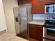 Kitchen features stainless steel appliances and granite countertops at 565 Peachtree Ne St # 1509, Atlanta, GA 30308