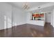 Spacious living room with hardwood floors and chandelier at 565 Peachtree Ne St # 1509, Atlanta, GA 30308