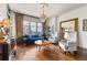Bright living room featuring hardwood floors and city views at 565 Peachtree Ne St # 1509, Atlanta, GA 30308