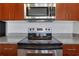 Stainless steel electric range and microwave at 565 Peachtree Ne St # 1509, Atlanta, GA 30308