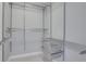 Large walk-in closet with wire shelving and drawers at 565 Peachtree Ne St # 1509, Atlanta, GA 30308